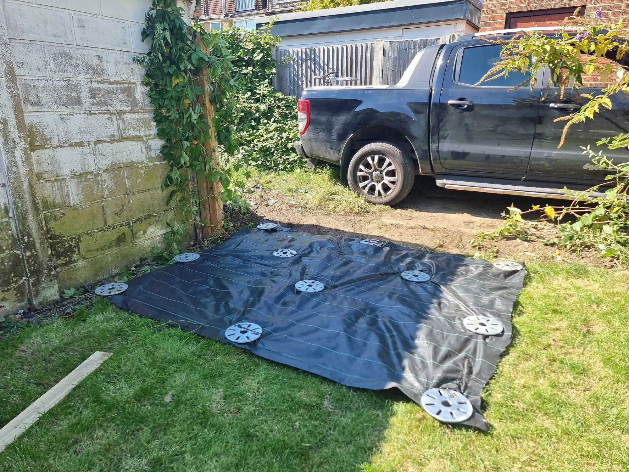 Foundation installed in a narrow side alley