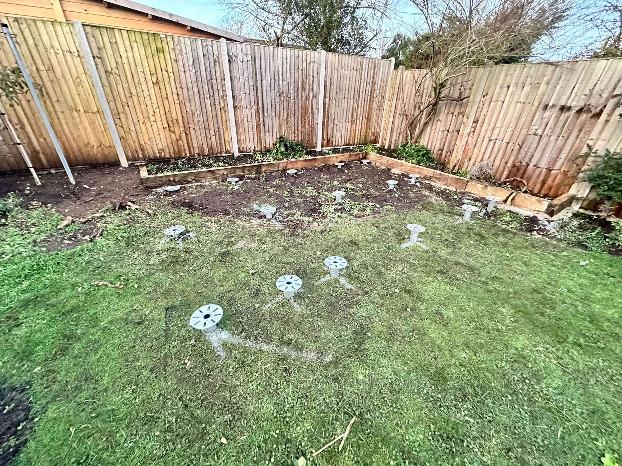 Close-up of screws neatly installed in a lawn